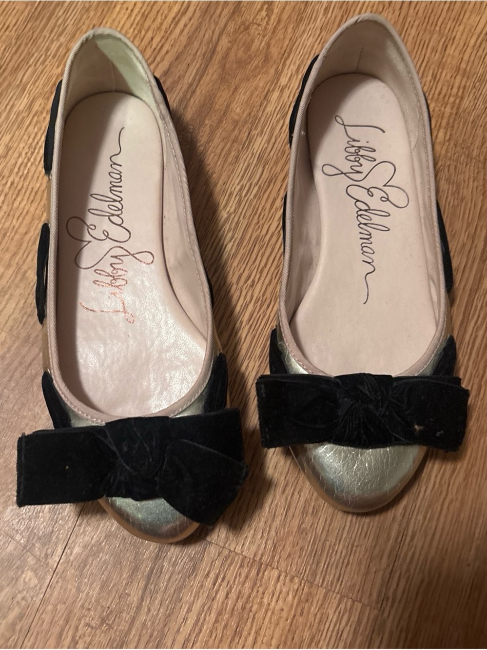 libby. edelman Metallic Gold Ballet Flats with Black Velvet Bow